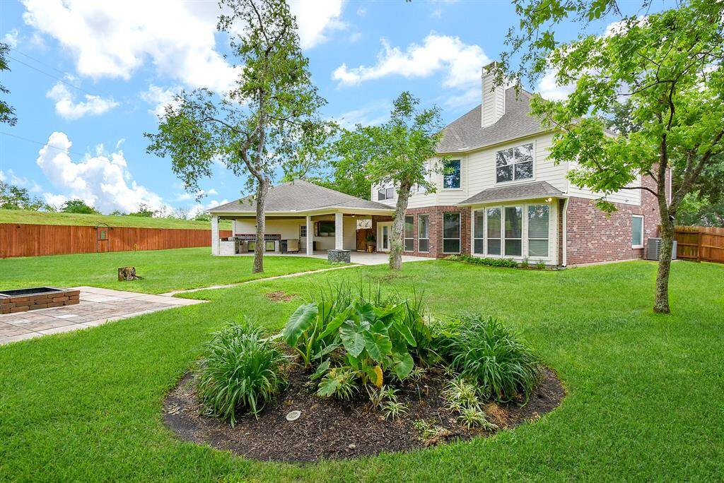 Beautiful trees include; • 2-pecans trees, 1-fig tree, 1-red maple tree, 1-oriental pear tree, 1-fuji apple tree, 4-amethyst wisteria climbing vines on outdoor arch and 2 oak trees in the front yard.