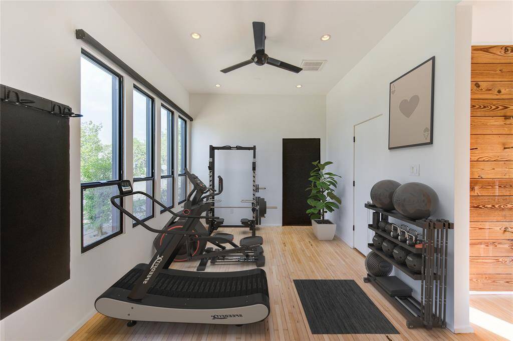 Most recently, this versatile space was a perfect home gym, offering ample room and natural light for your workouts.