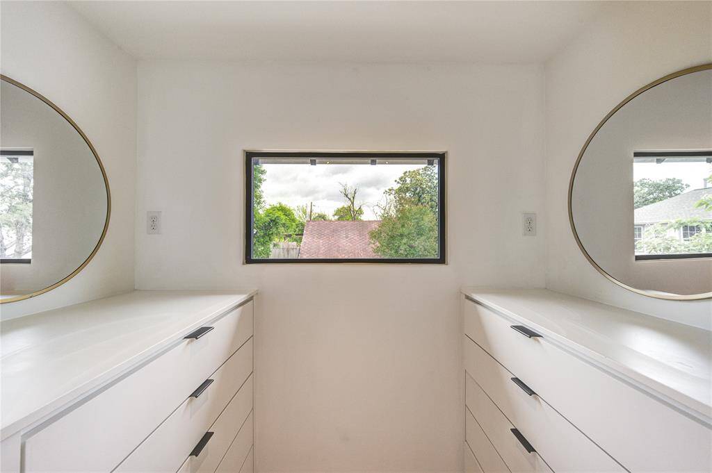 Elegant dual vanities with ample storage space.