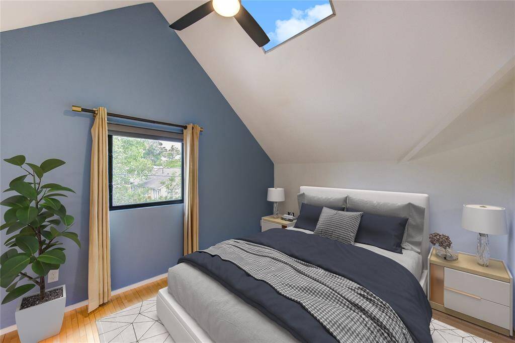 Virtually staged bedroom featuring elegant decor, a cozy atmosphere, and ample natural light. Ideal for creating your perfect retreat.