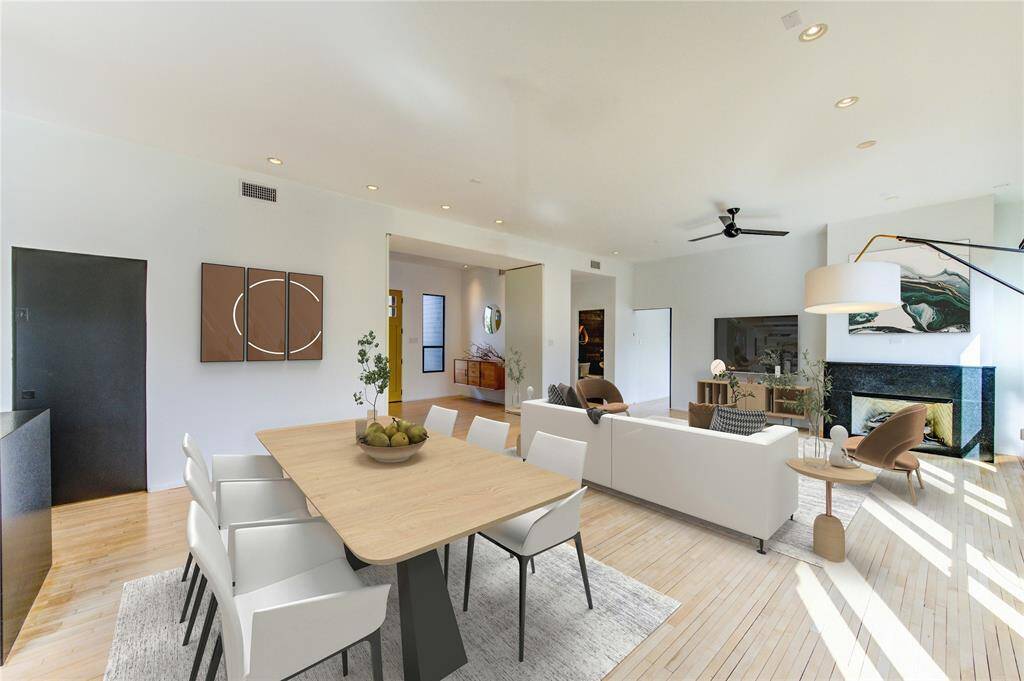 Spacious dining/living room combo accommodates a table for up to eight and ample seating living room options. Virtually staged for inspiration.