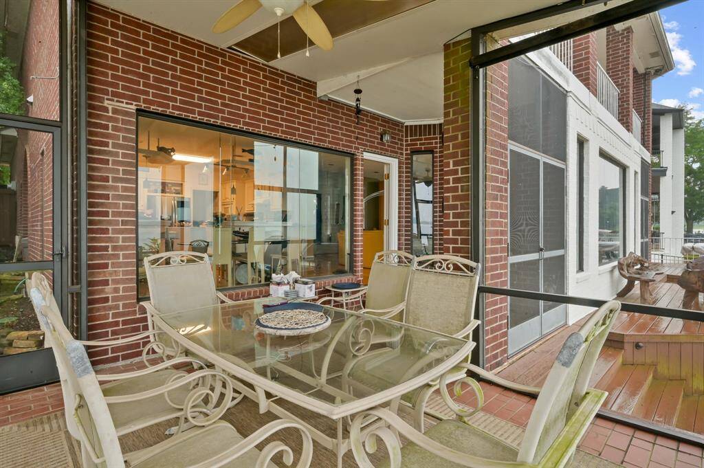 Covered screened in porch off the dining area