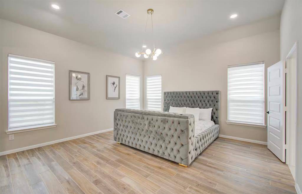 Step into the sanctuary of theprimary bedroom.