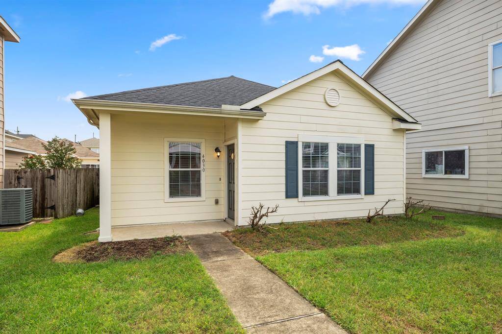 Welcome to this cozy 2-bedroom, 1-bathroom home, offering great curb appeal with its charming front porch and shutters on the windows. The home is equipped with gutters for added convenience, making it a practical and inviting space from the moment you arrive.