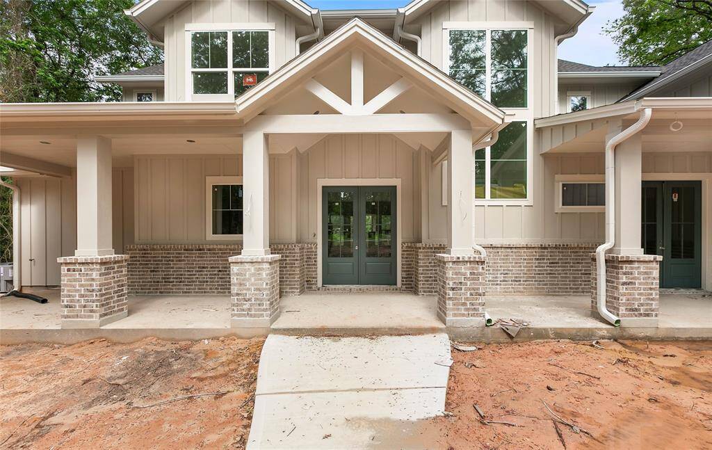 Gracious front porch welcomes you home.