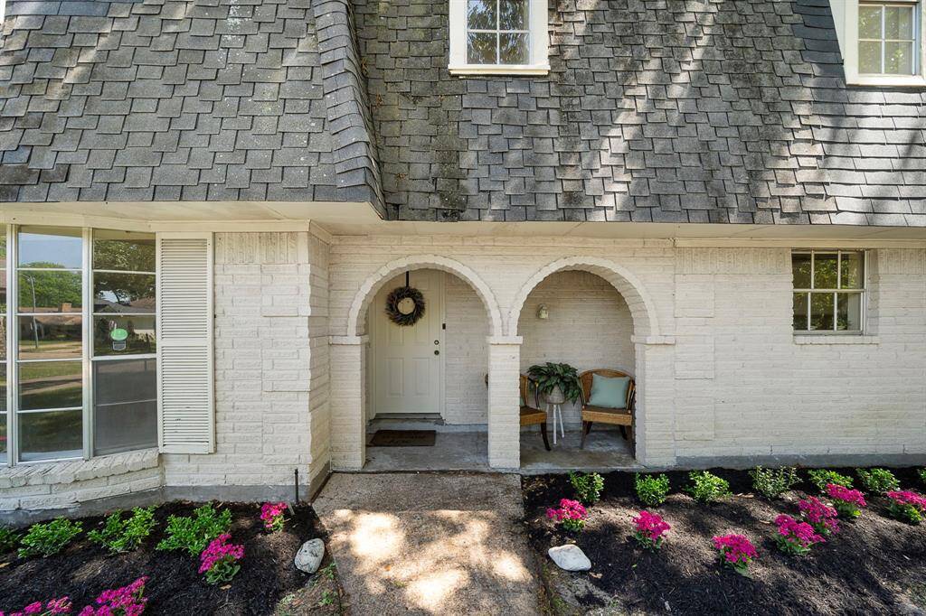 Darling curb appeal with inviting front porch.
