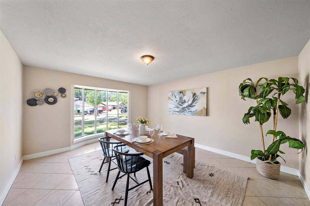 Staged as a massive formal dining room but could be a game room, formal living room, play room or extra large office.