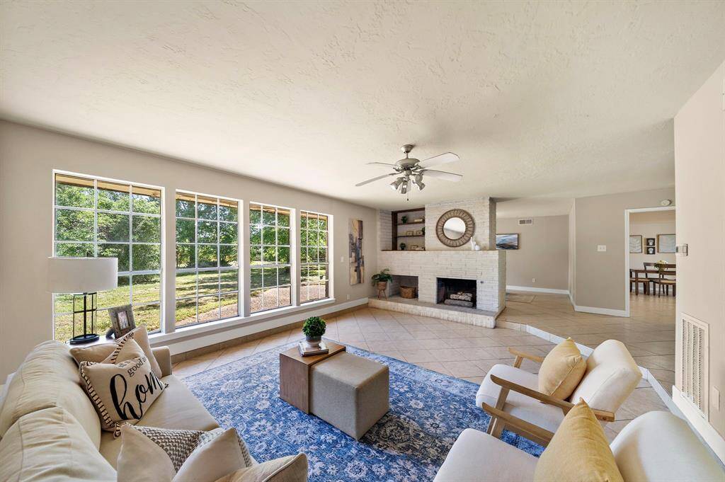 The semi open floorplan allows for easy sight lines while maintaining a slight privacy to each space...very popular!