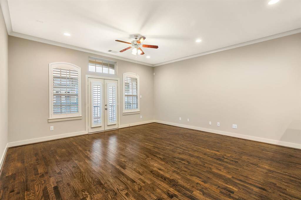 Living room space is also large with balcony off the side.