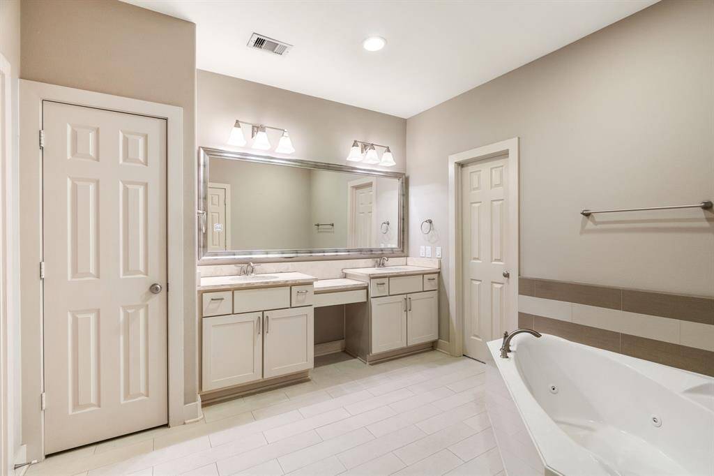 Double vanity in primary bathrrom.