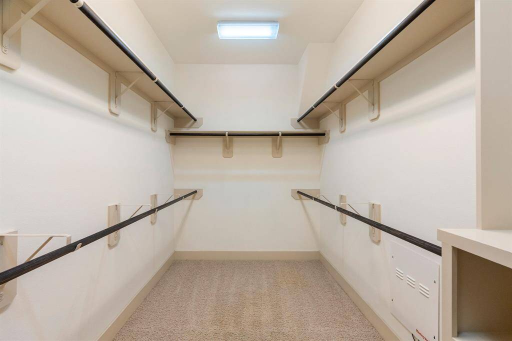 Another primary closet view.