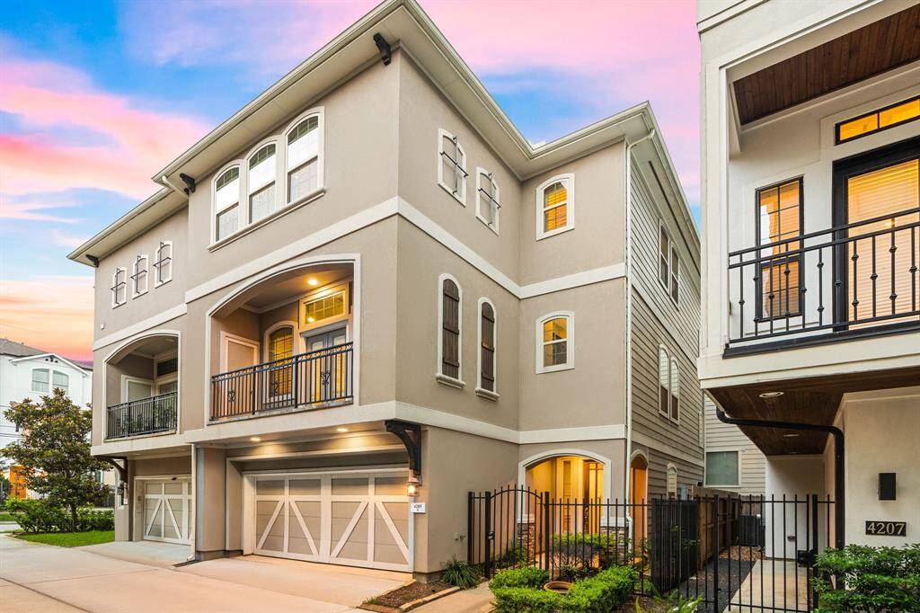 Front Elevation of the Home showing the gated court yard entrance.