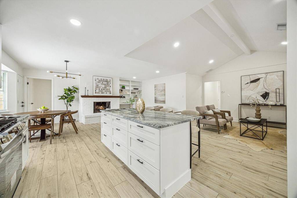 View into the living room and breakfast area from the kitchen
