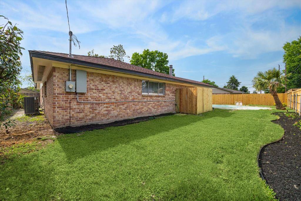 Enjoy the greenspace in the backyard, perfect for relaxing, gardening, or outdoor fun.