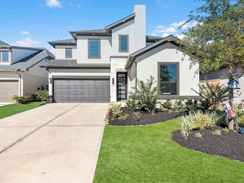 Discover your dream home! READY to move in This modern residence features a spacious layout, beautiful landscaping, and a welcoming entrance. Perfect for your next chapter.
