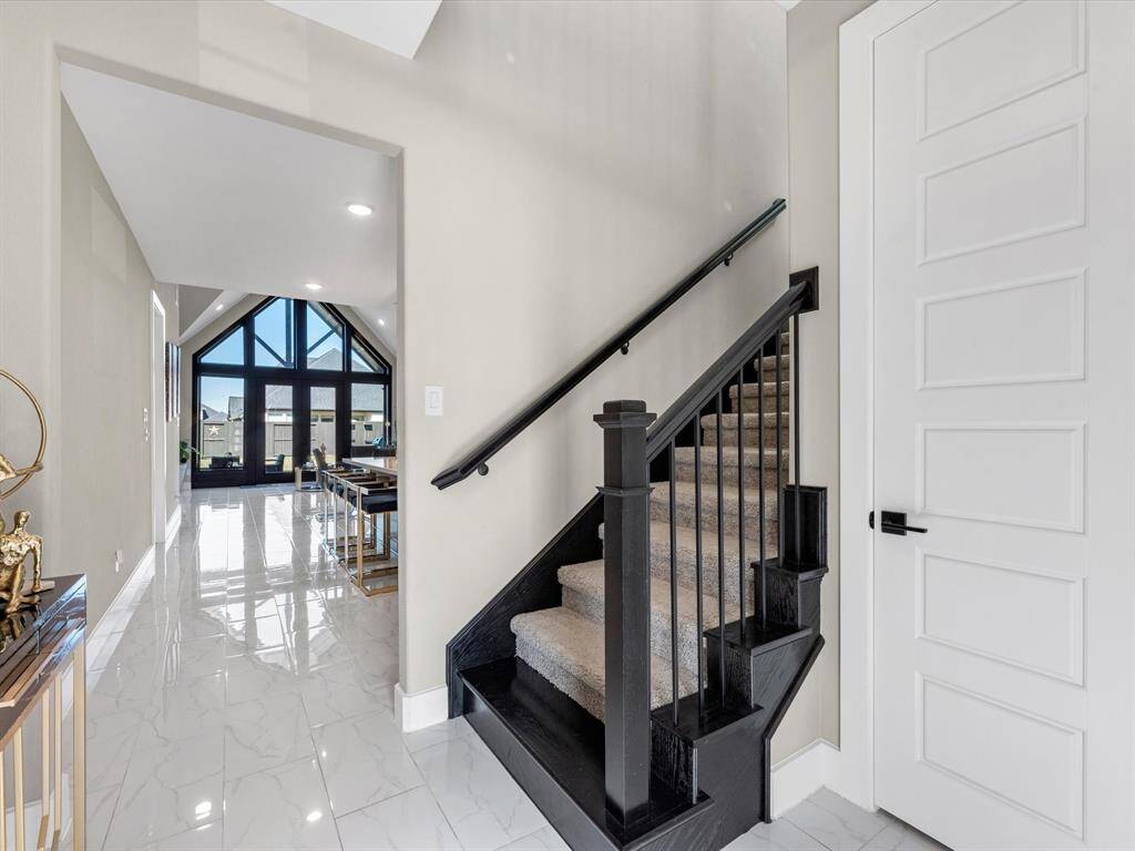 This stunning house features several upgrades and state of the art Aquasure Harmony Series 48,000 Grains Whole House Water Softener, the sleek modern stairs  takes you  to a second story created for the family to enjoy!