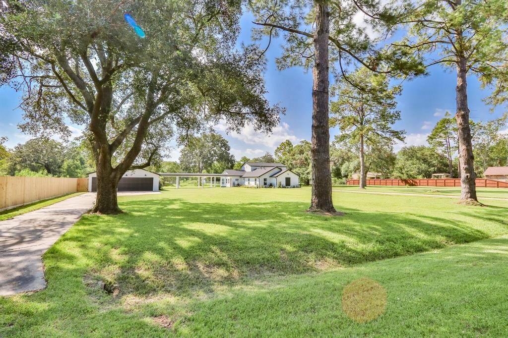 Gorgeous Style Stacked with Lifestyle Advantages. This property features two separate driveways; 1 lead to the detached garage with 2 bonus climate-controlled rooms and the other one leads directly to the home.