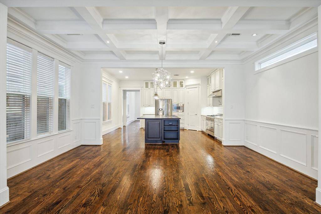 From this vantage point, the home’s thoughtful design and architectural details take center stage. A seamless blend of elegance and functionality—this open-concept design creates the perfect flow between dining, kitchen, and living spaces.