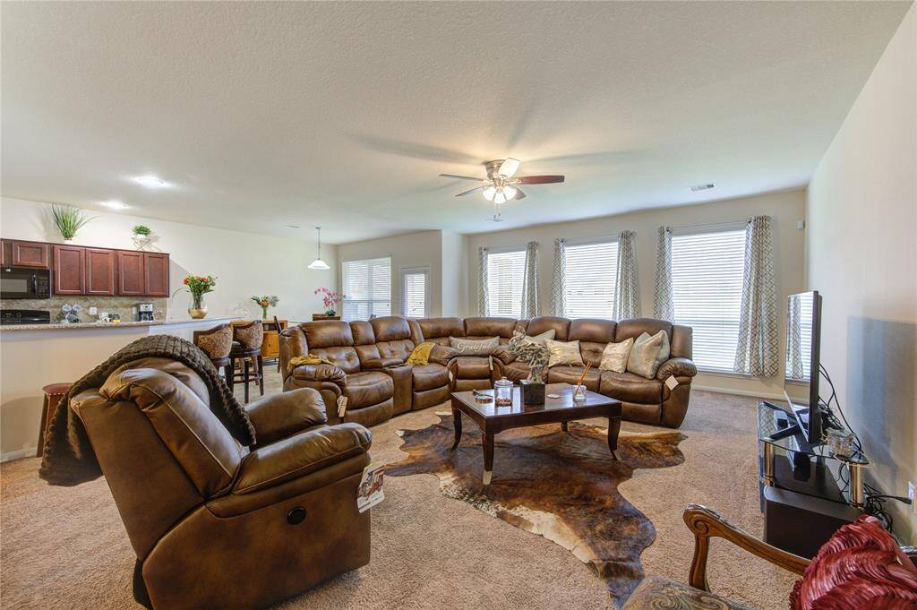 Natural light and neutral tones make the possibilities unending in this living room.