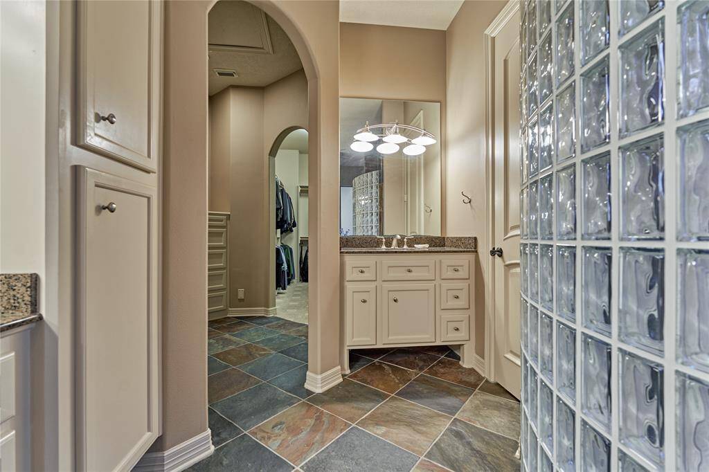 On the left is the entrance to the massive primary closet.