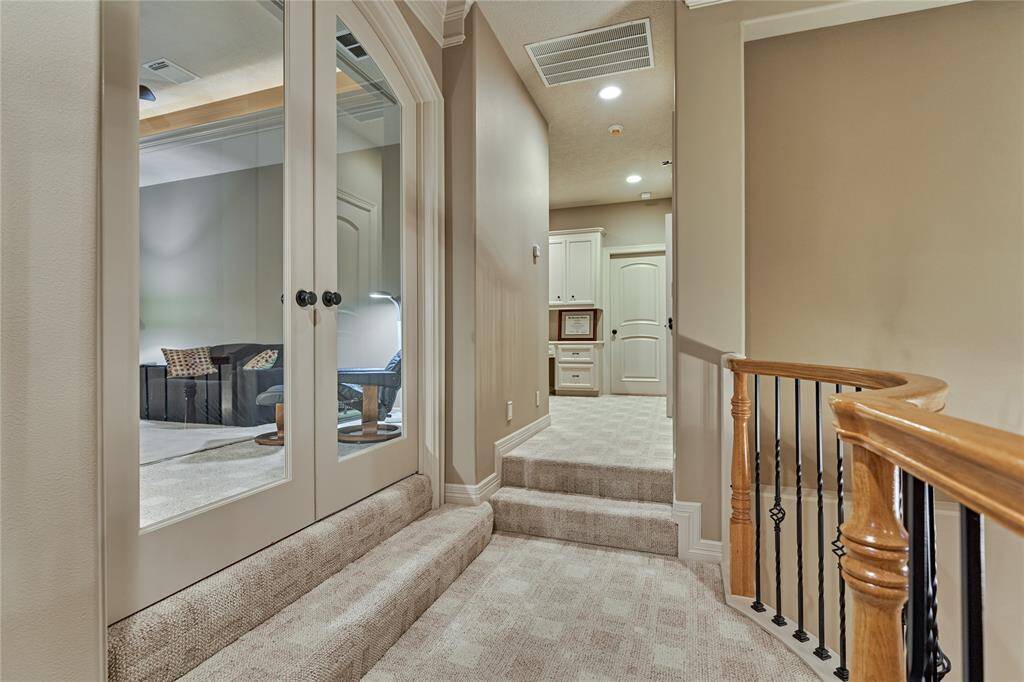 The second floor features a game room and two secondary bedrooms with their own private ensuites.