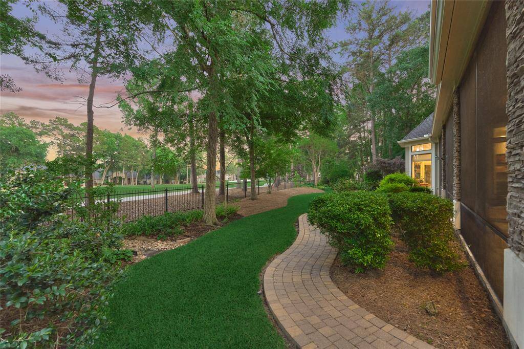 Enchanting backyard with far-reaching golf views.
