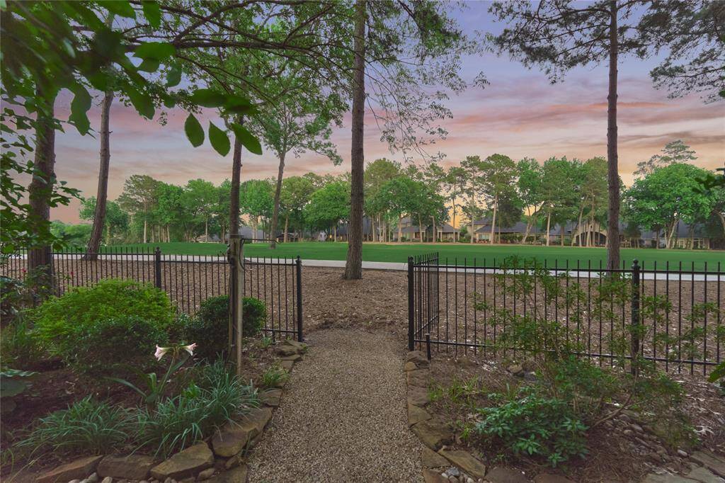 This sprawling golf course lot offers views of two Miller golf holes.