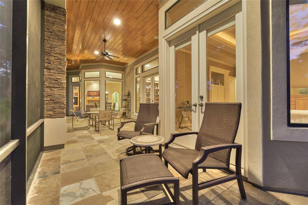Relax year-round on the screened porch, sheltered from the elements.