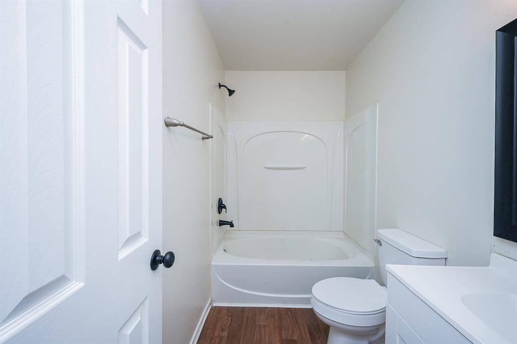 Spacious full bathroom conveniently located upstairs.