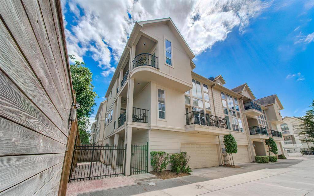 Welcome to 4526 Lillian St., nestled in the heart of Rice Military. This stunning corner-unit home offers exceptional curb appeal, three balconies, and a private side yard—all in a gated community just minutes from Memorial Park and Washington Ave.