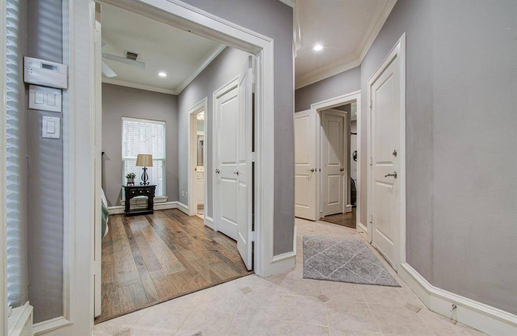 Step inside to find two bedrooms on the first floor, including one with its own en-suite bath—perfect for guests or a home office setup.