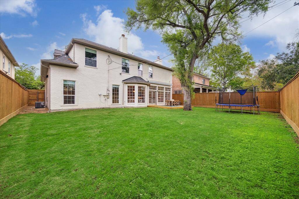 The expansive backyard provides an ideal setting for both leisure and entertainment, with generous space to accommodate a pool, should you choose.