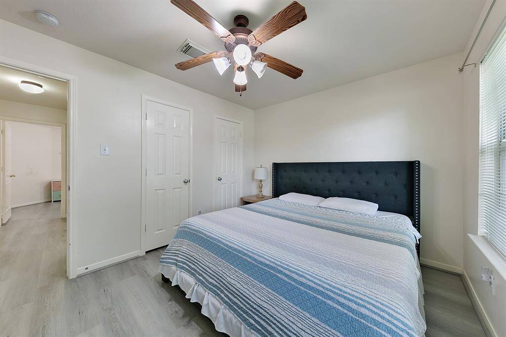 The well-sized secondary bedrooms offer plenty of space for comfort and privacy. The second bathroom, conveniently located nearby, completes this thoughtfully designed split-plan layout.