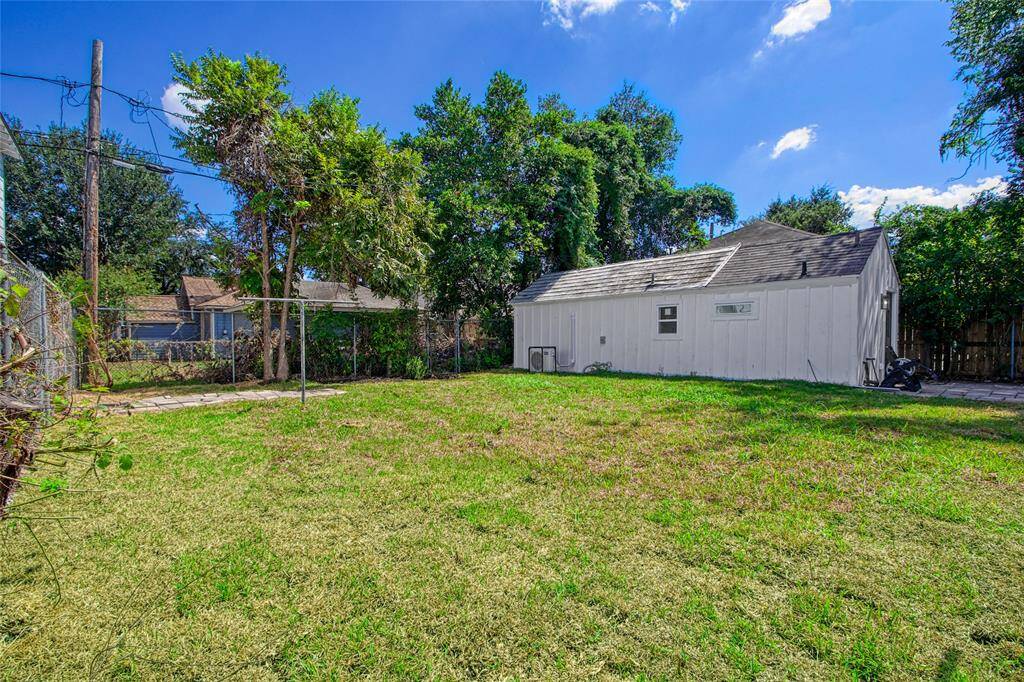 Back yard and back apartment to the left