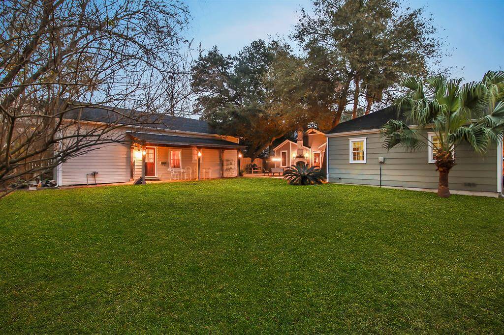 Large green area in the backyard has been left intentionally uncluttered by trees. This area is ready to play, sports or gardening. There is enough space to build a swimming pool here!