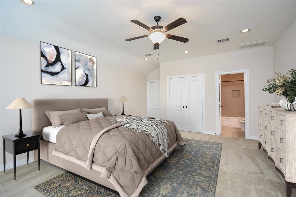 This upstairs open area includes a full bathroom, a spacious closet, and an oversized attic space with the potential to be extended for even additional storage, if desired.