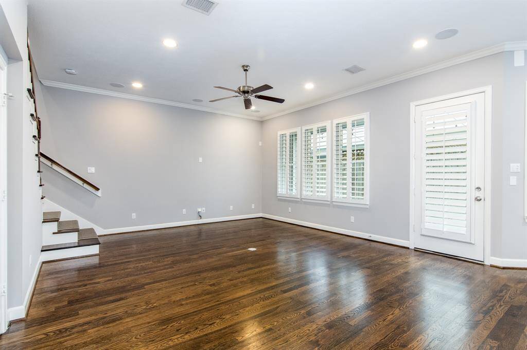 The large living room features hardwood floors and even has a floor plug, making set-up a breeze.