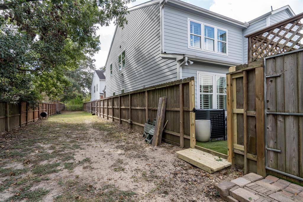 The home has direct gated access to the community green space.