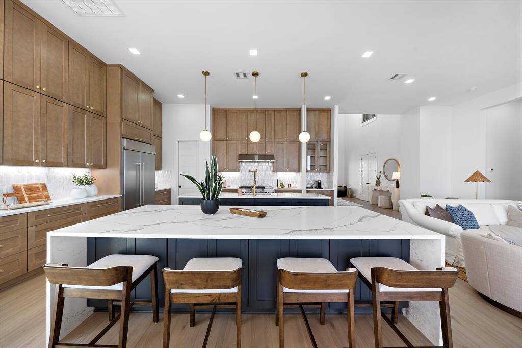 The double islands allow for perfect entertainment! All Quartz Stone for beauty and durability!