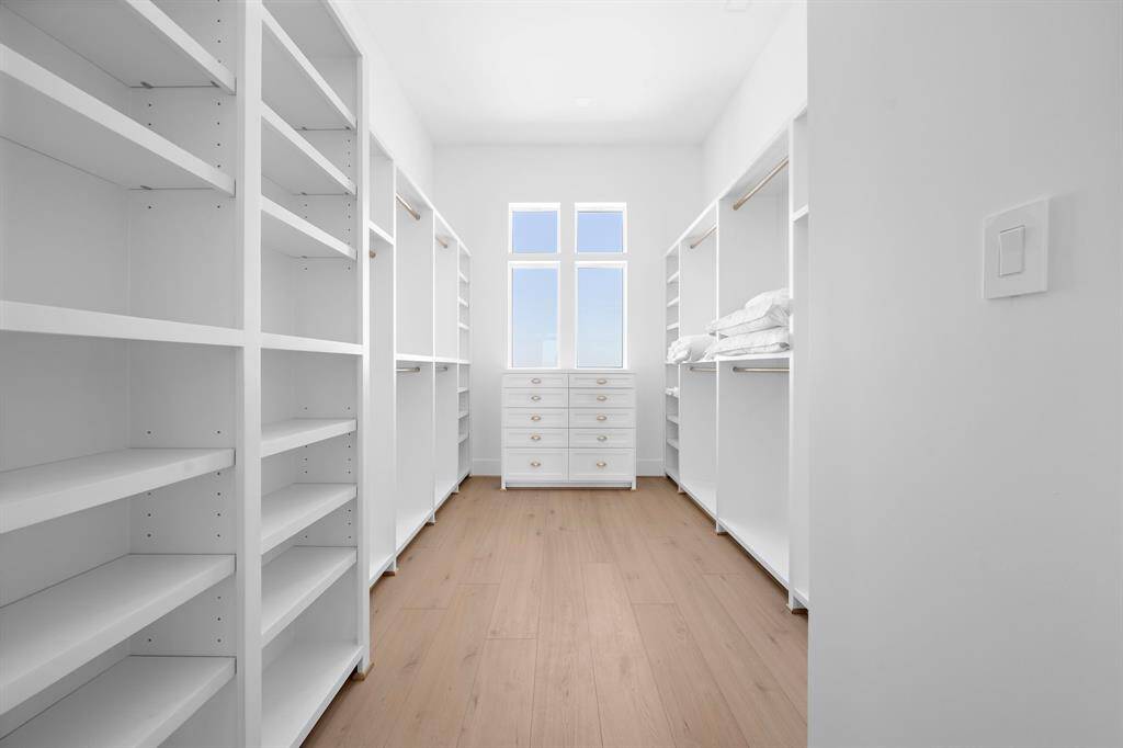 Hers closet.. with an impressive amount of space.