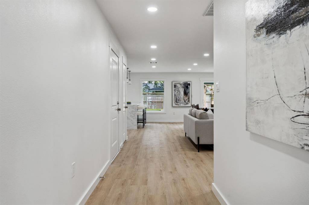Clean sightlines and natural light welcome you into the heart of the home.
