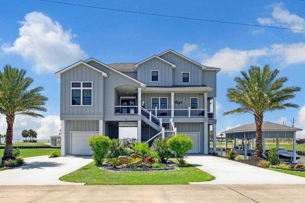 Step into luxury with this stunning 3,306 sq ft home, where thoughtful design meets coastal elegance. The beautifully landscaped exterior features meticulous hardscaping and two majestic Medjool Date Palms, creating striking curb appeal and a warm welcome from the moment you arrive