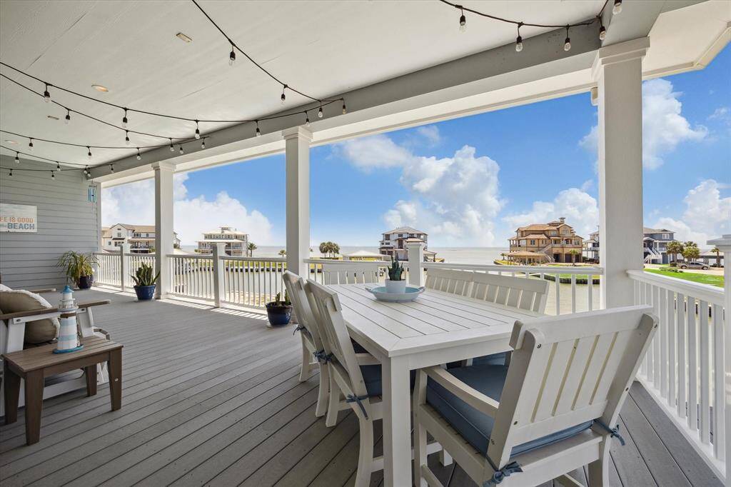 Whether sipping morning coffee or enjoying evening sunsets, this porch is a peaceful retreat with panoramic vistas of the bay