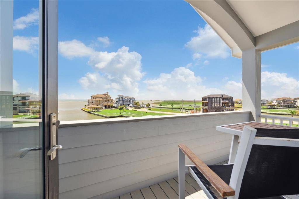 The primary private balcony with ever-changing scenes of the bay, this view never gets old and offers a daily dose of vitamin sea and natural beauty
