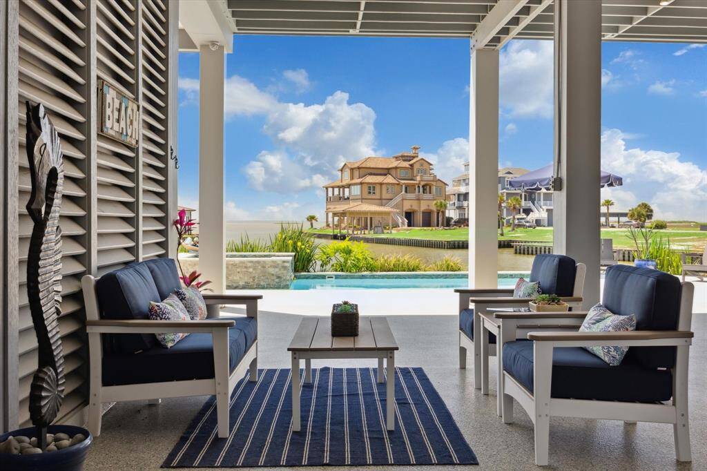 Epoxy floor coating throughout the under porch dockside living areas and all garages offering durability, resistance to chemicals & stains, easy maintenance  & aesthetic appeal