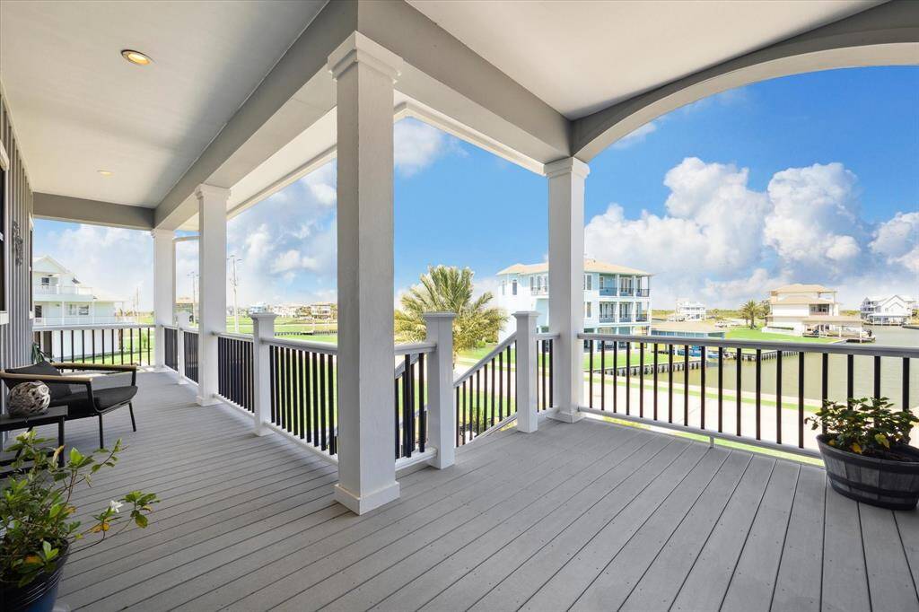 Take in the breathtaking water views from the expansive covered balcony—a perfect spot to unwind, entertain, or simply enjoy the seabreeze