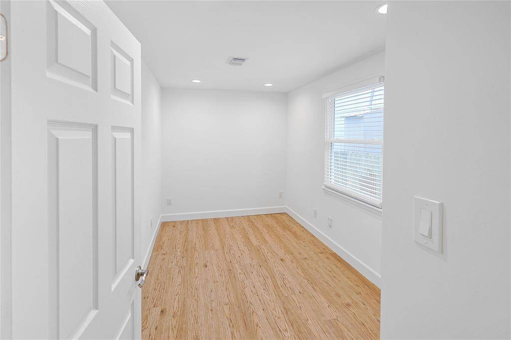 This second bedroom could be used as a flex space for any office, hobby or leisure needs.