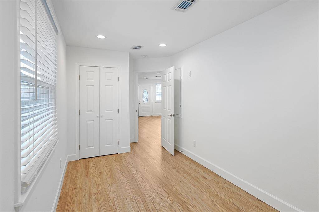 French door closet in the second bedroom to accommodate all storage needs.