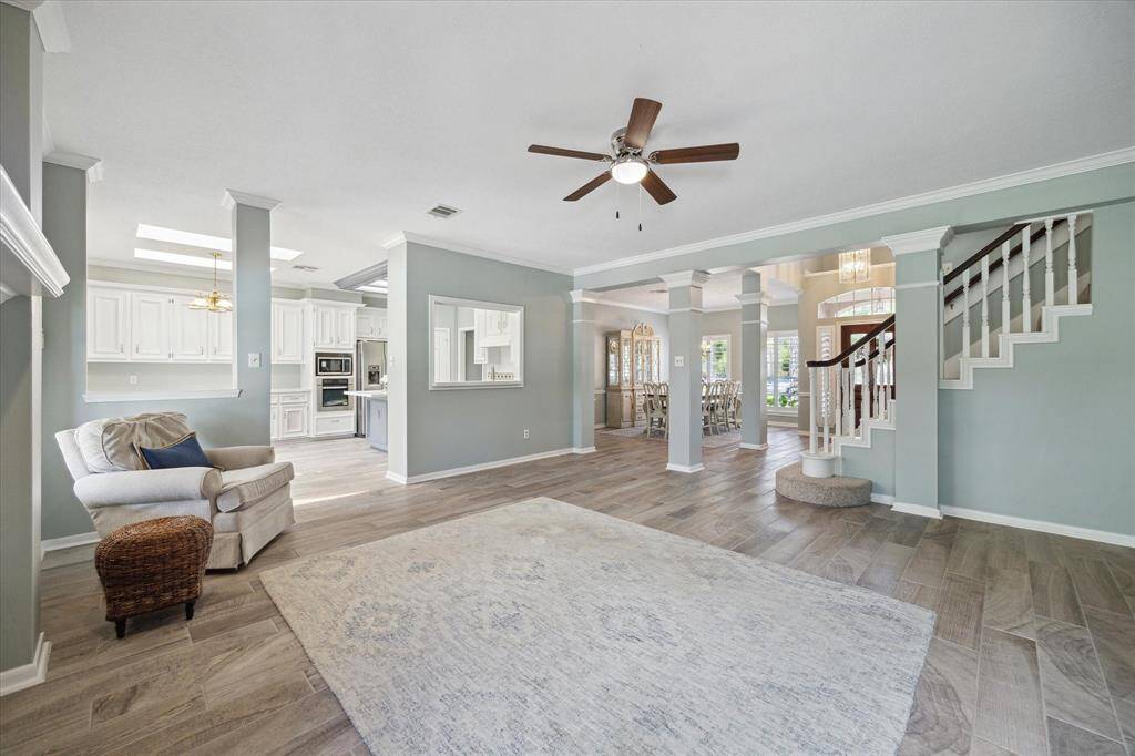 A soothing color palette and open layout create a welcoming atmosphere with plenty of space for both quiet moments and lively gatherings with family and friends.