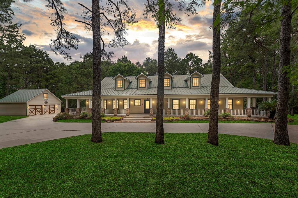 Welcome home to 519 Dodge Oakhurst nestled amongst the trees in Huntsville, Texas! A fabulous 21+ acreage property awaits you to live out your DREAMS!